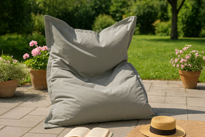 Pouf rettangolare grigio fumé con atmosfera concept Moku