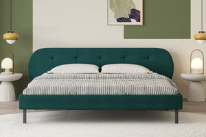 Letto capitonné 140x190 cm verde con testiera e rete Tulsa foto d’ambiente