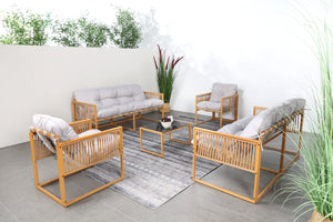 Salotto da giardino 8 posti effetto rattan rattan naturale e grigio chiaro Turini — foto ambientata