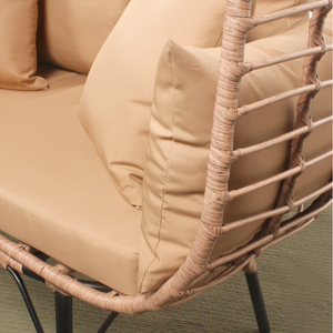 set da esterno con poltrona su gambe effetto rattan e poggiapiedi cuscino di grandi dimensioni beige set zoom concept u