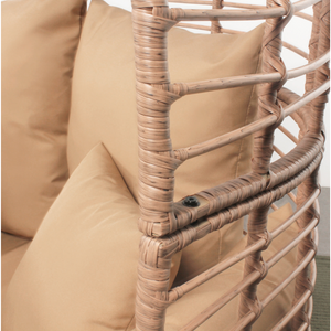 set da esterno poltrona su gambe effetto rattan e poggiapiedi cuscino beige di grandi dimensioni fascio zoom dettagli poltrona concept u