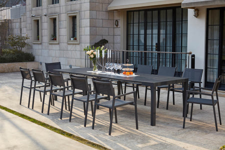 Consolle allungabile in alluminio e 12 sedie