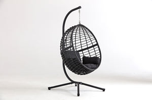Sedia sospesa in stile rattan intrecciato in resina nera concept u