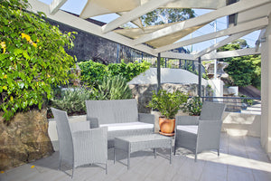 Set da giardino a 4 posti in resina intrecciata grigio e bianco concept u